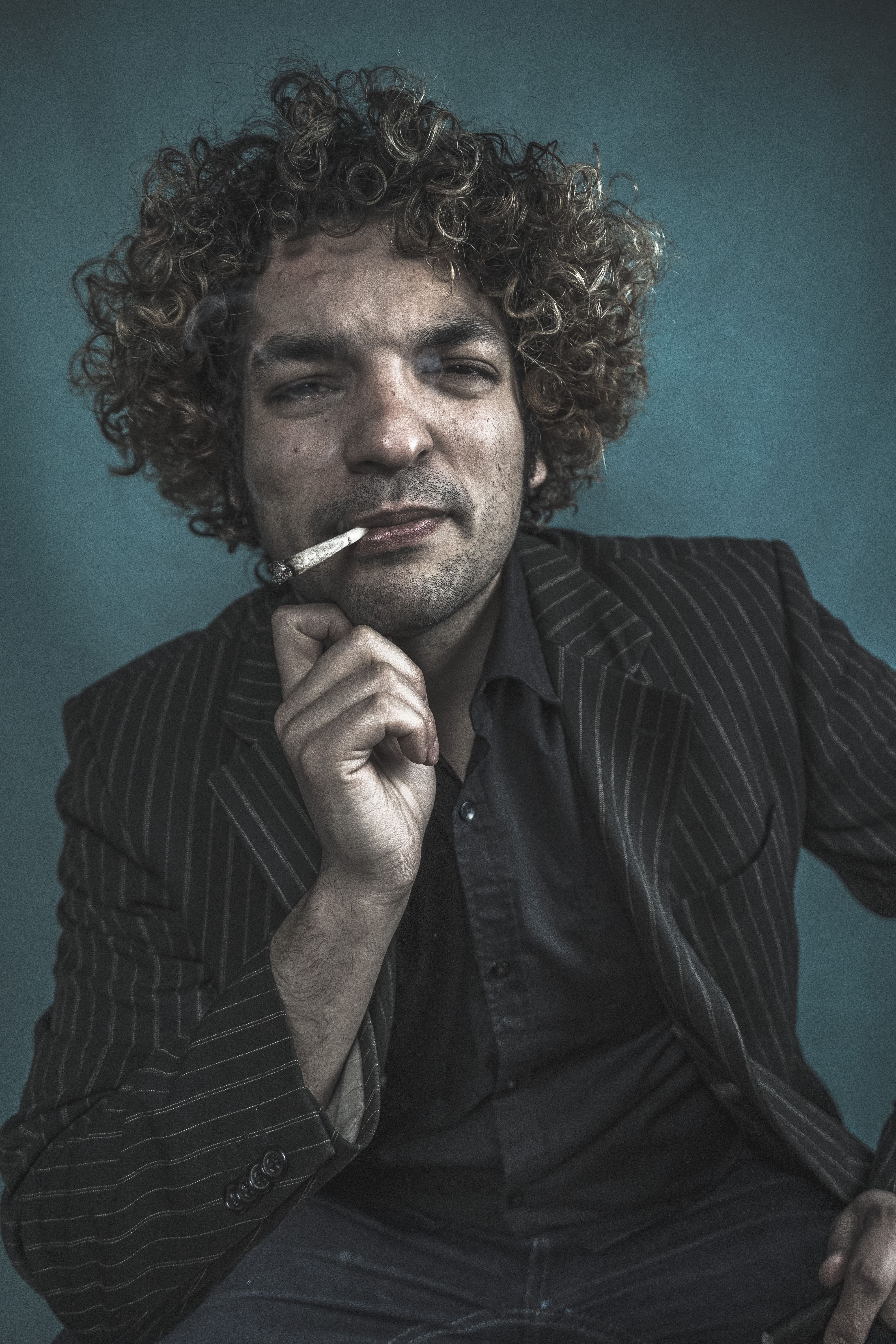 Portrait d'homme avec cigare — photographie artistique par Maëlle Vétois